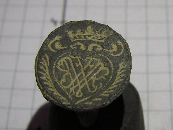 Pečetidlo s monogramem W.X.