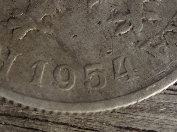 25 hal. 1954