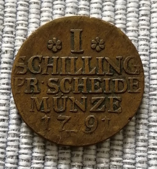 1 schilling (šilink)