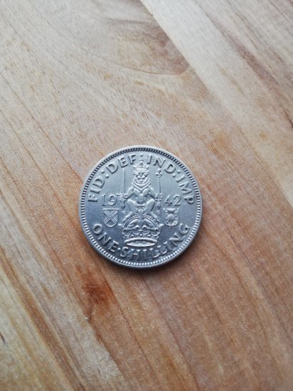 One Shilling