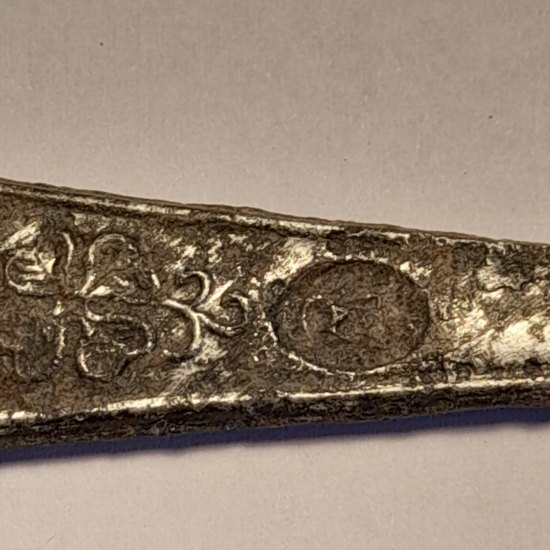 Ornate broken spoon handle