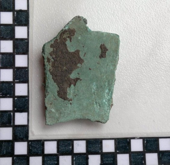 Fragment bronzového srpu