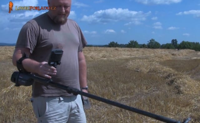 CTX 3030 metal detector in a mown field